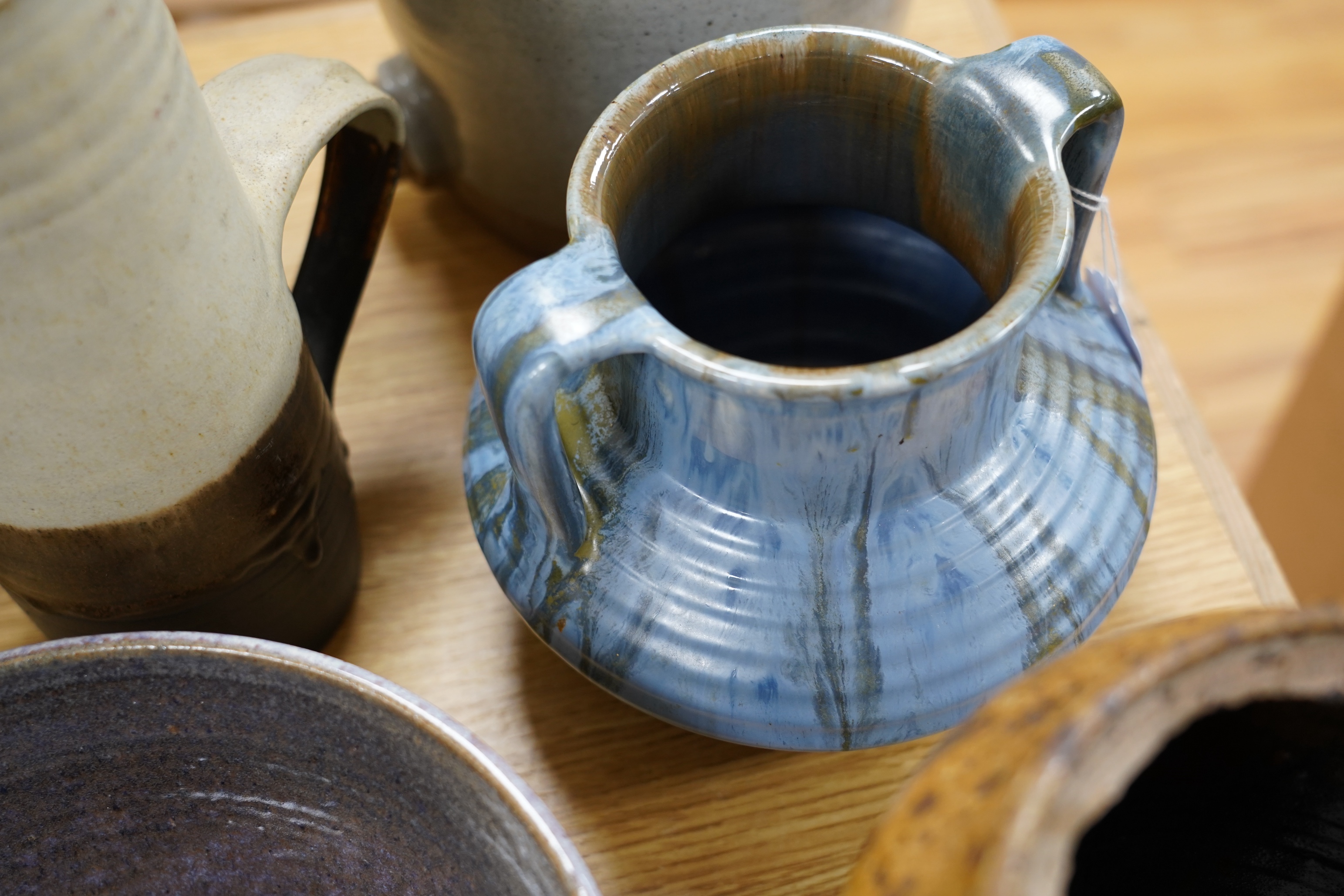 Nine studio pottery jugs, a vase and a bowl, etc. (11)